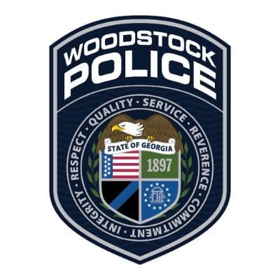 Woodstock public safety heroes shop with nearly 100 children